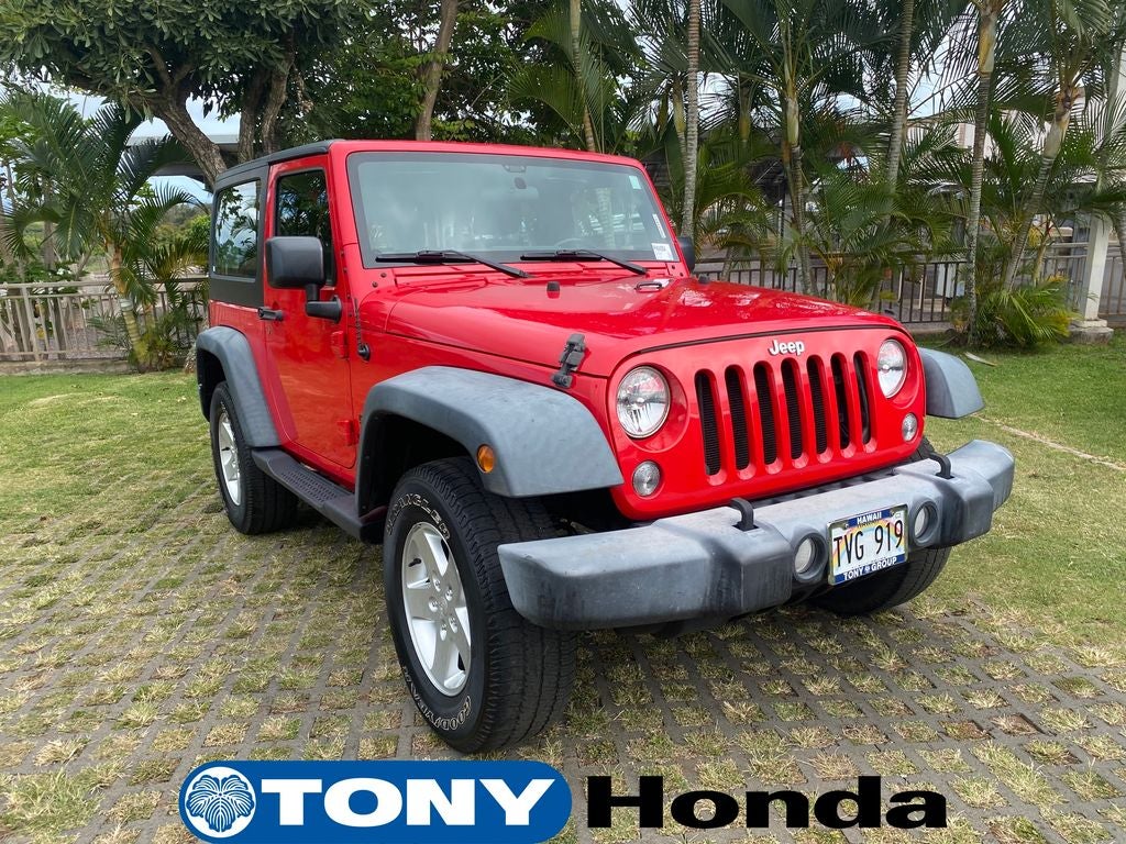 2016 Jeep Wrangler Sport in Firecracker Red Clearcoat — front three-quarter view