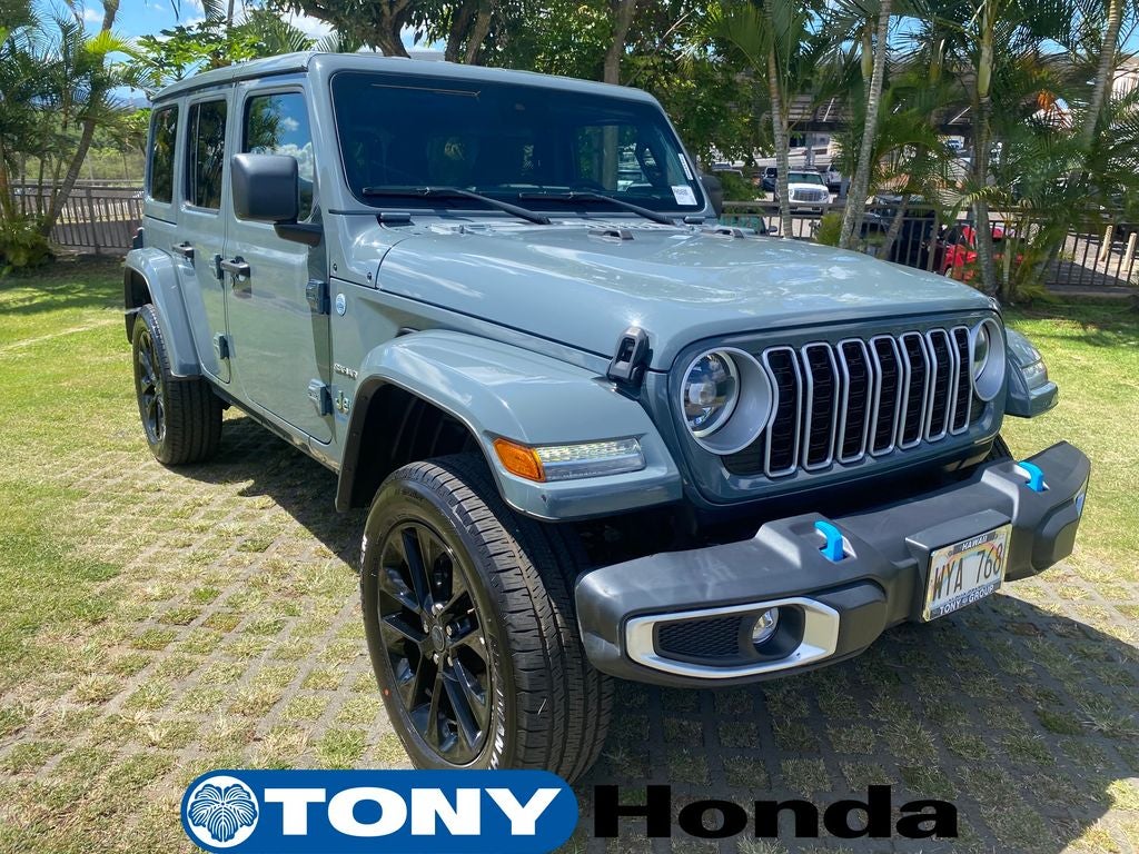 2024 Jeep Wrangler Sahara 4xe in Anvil Clear Coat — front three-quarter view