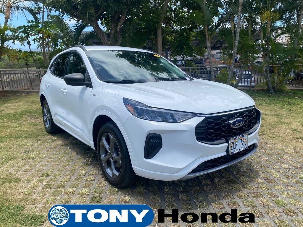 2023 Ford Escape ST-Line in Oxford White — front three-quarter view