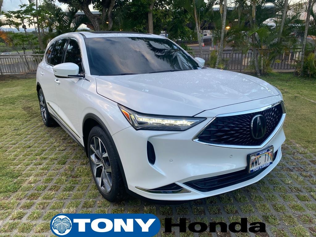 2023 Acura MDX Technology in White — front three-quarter view