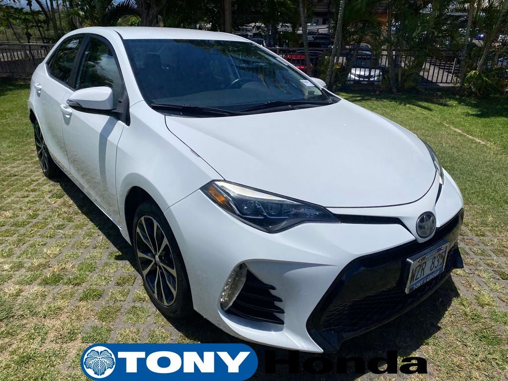 2017 Toyota Corolla SE in Super White — front three-quarter view
