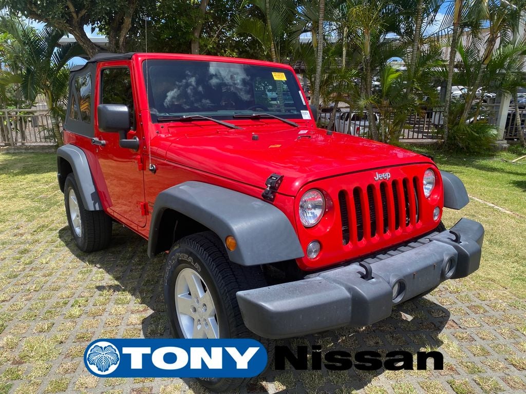 2017 Jeep Wrangler Sport in Firecracker Red Clearcoat — front three-quarter view