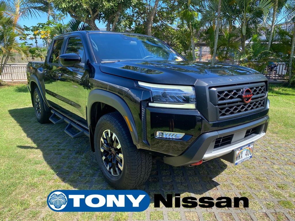 2023 Nissan Frontier PRO-4X in Super Black — front three-quarter view
